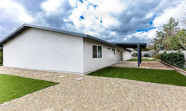 a backyard of a house with lots of green space