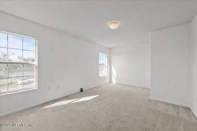 en empty room with windows