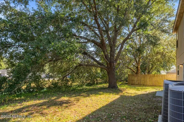 a view of yard with trees