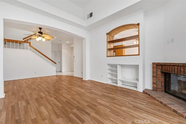 a bathroom with a sink toilet and a mirror