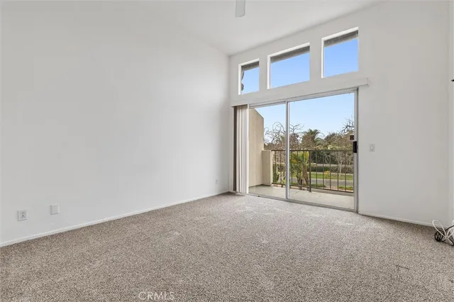 an empty room with a large window