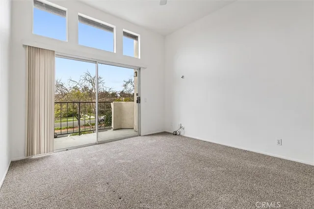 a bathroom with a double vanity sink mirror and shower
