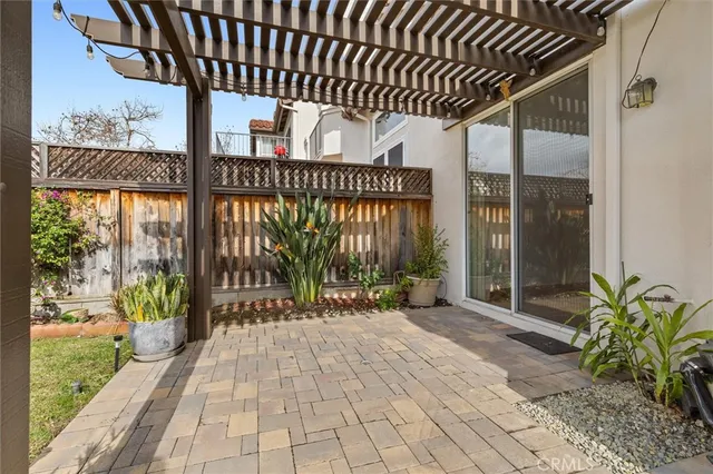 an aerial view of a houses with outdoor space