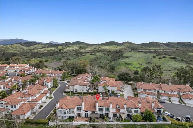 a view of a park with large trees