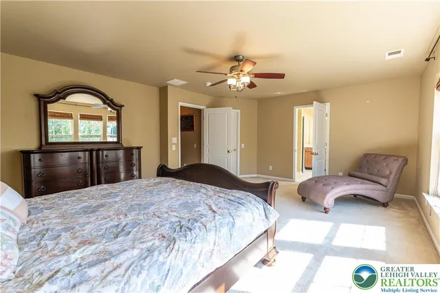 a bathroom with a bathtub and a sink