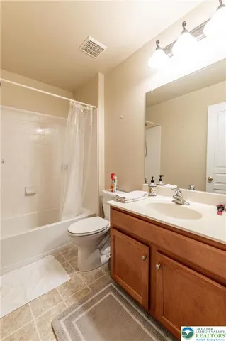 a view of balcony with wooden floor and fence