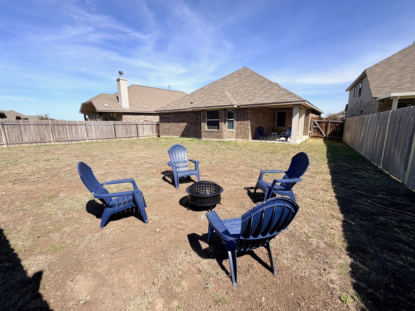 1005 Sundrops Street Leander, TX 78641 - Photo 28 of 39 a front view of house with yard and seating