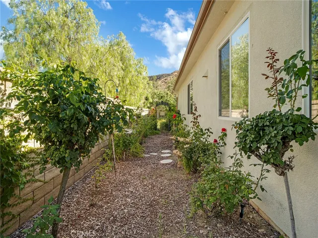 a backyard of a house with lots of green space
