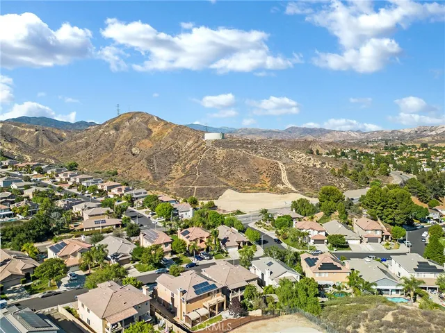 an aerial view of residential building with outdoor space