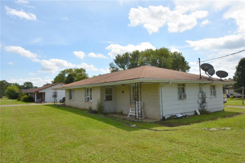312-314 Mohawk School Road New Castle, PA 16102 - Photo 5 of 14 Duplex has brick front cladding front exterior & wood siding sides and rear.
