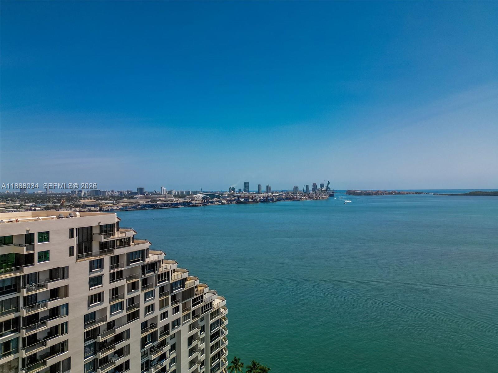 520 Brickell Key Drive, Unit UPH03 Miami, FL 33131 - Photo 8 of 33 a view of a lake with a city