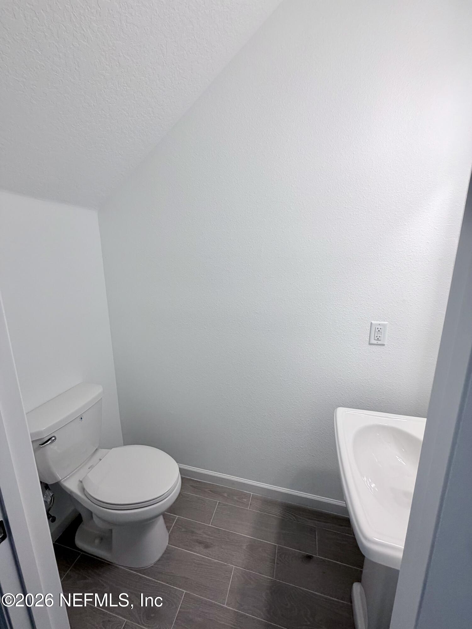 2113 Windward Cay Lane Middleburg, FL 32068 - Photo 33 of 34 a white toilet sitting next to a white toilet