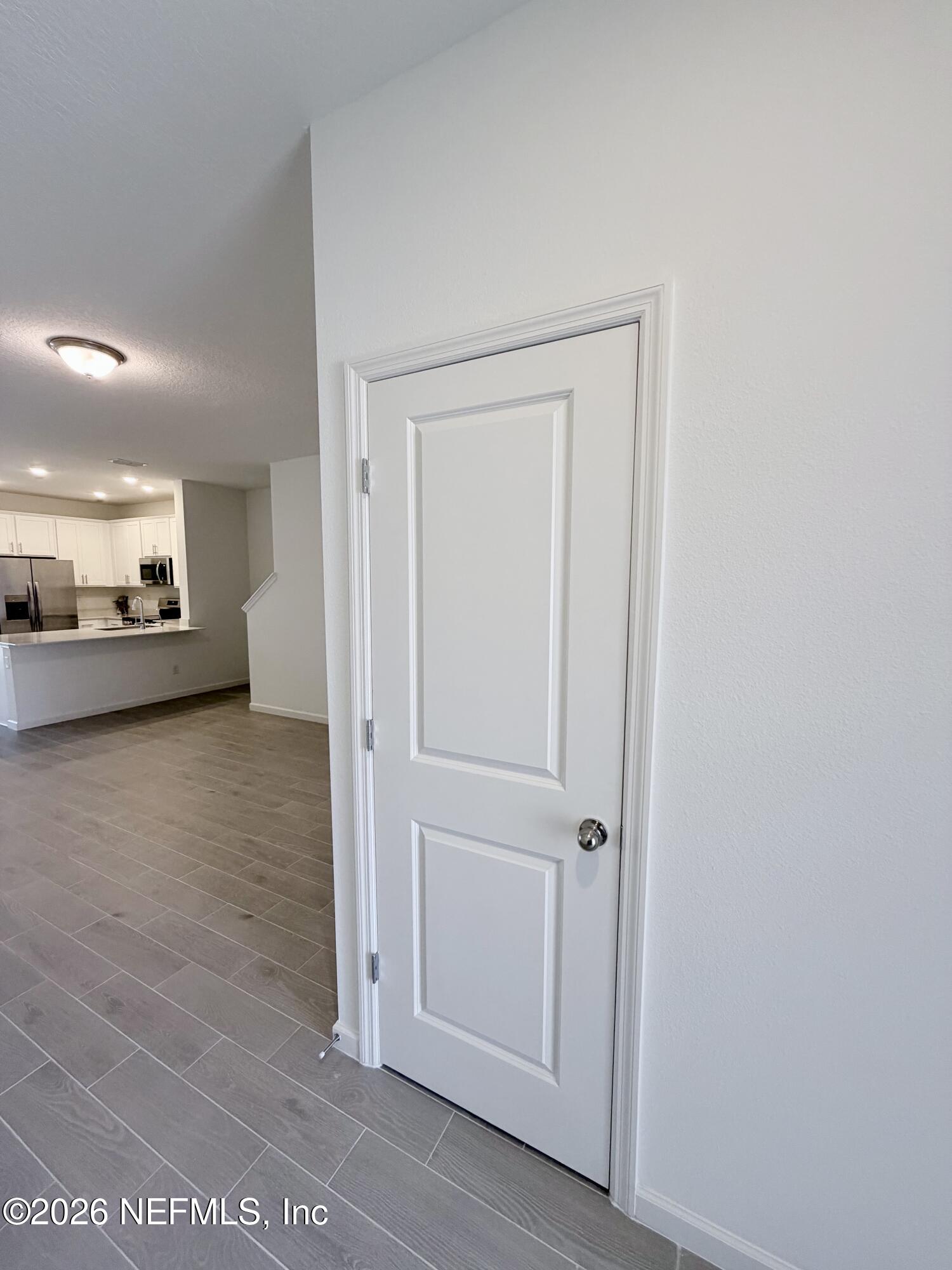 2113 Windward Cay Lane Middleburg, FL 32068 - Photo 4 of 34 a view of a hallway with a livingroom