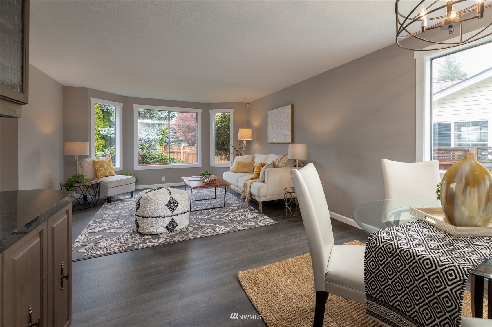 1026 207th Place Southeast Bothell, WA 98012 - Photo 6 of 27 a living room with furniture and a large window