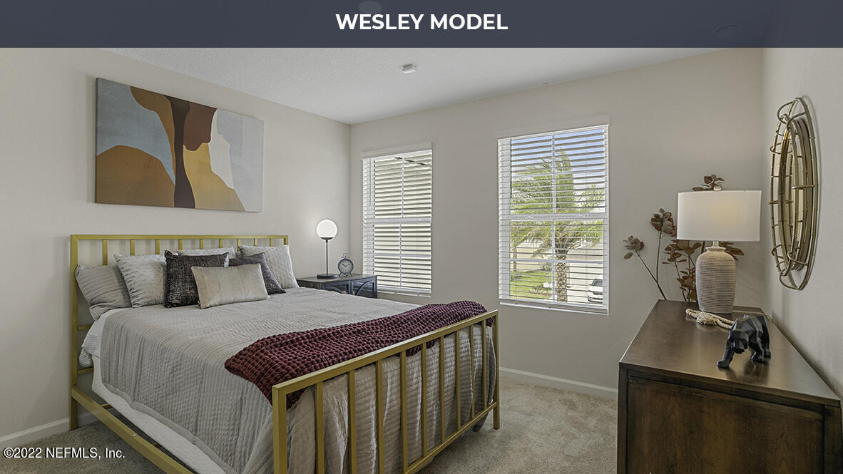 48 Barley Street St. Augustine, FL 32092 - Photo 12 of 37 a bedroom with a bed next to a window