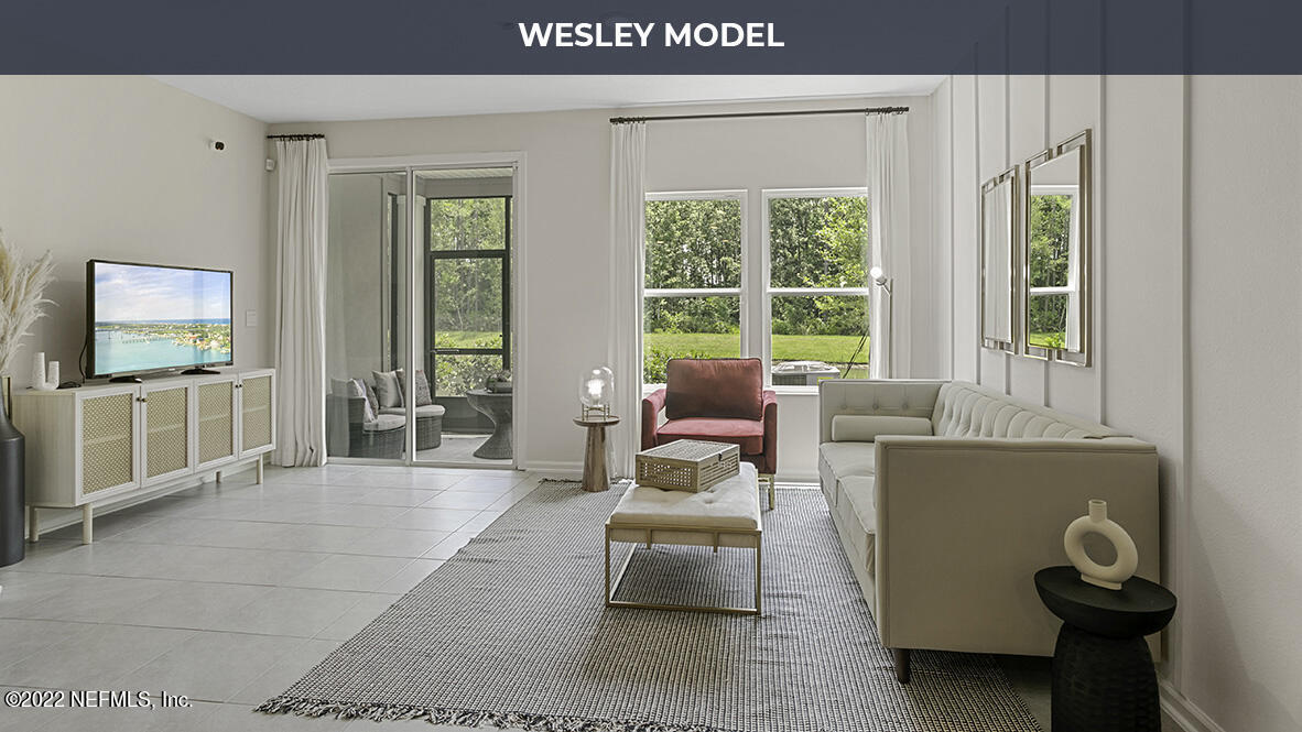 48 Barley Street St. Augustine, FL 32092 - Photo 8 of 37 a living room with furniture and a flat screen tv