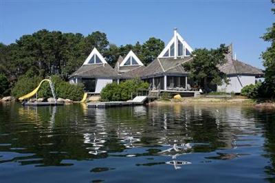 222 Hayes Road Centerville, MA 02632 - Photo 3 of 23 a view of a house with a lake view