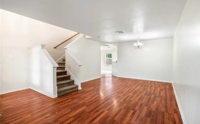 a view of entryway with wooden floor
