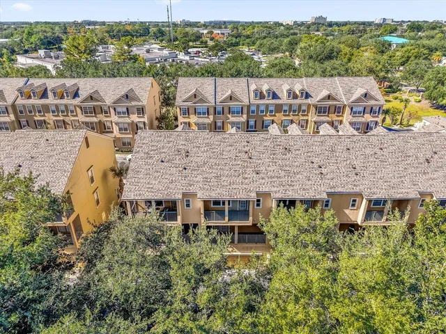 a view of a houses with a city view