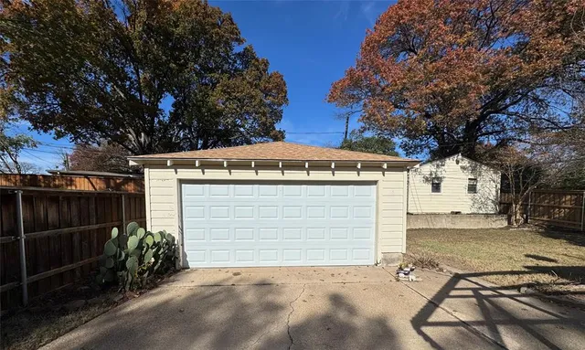 a view of a house with a snow in the yard