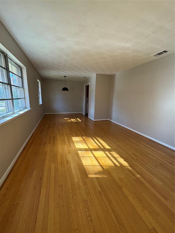 2261 Springhill Drive Dallas, TX 75228 - Photo 2 of 12 a view of empty room with windows