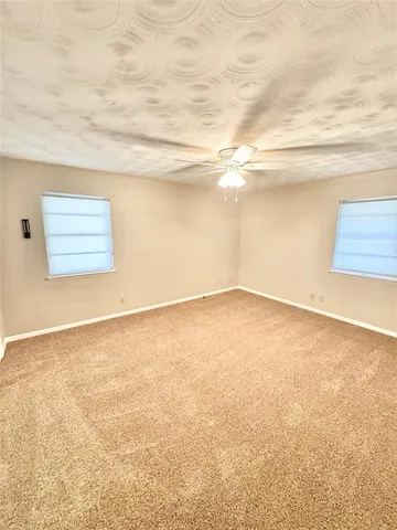 a bathroom with a sink a mirror and a shower