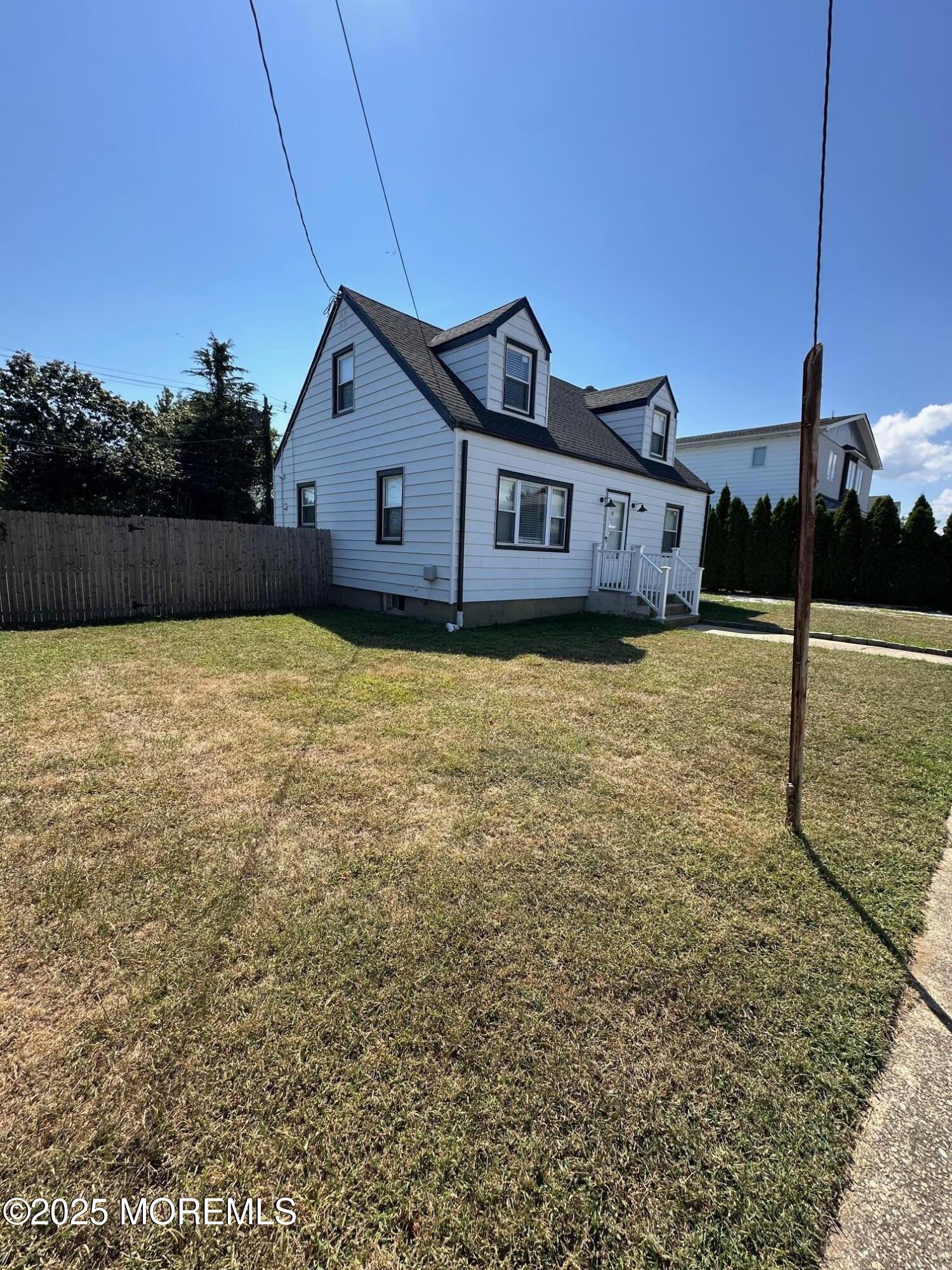 10 Cambell Court, Unit W Deal, NJ 07723 - Photo 2 of 28 a house view with a backyard space