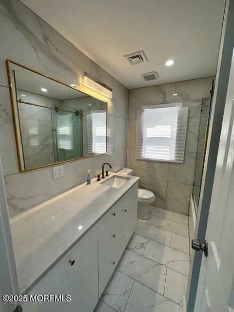 10 Cambell Court, Unit W Deal, NJ 07723 - Photo 22 of 28 a bathroom with a double vanity sink mirror and toilet