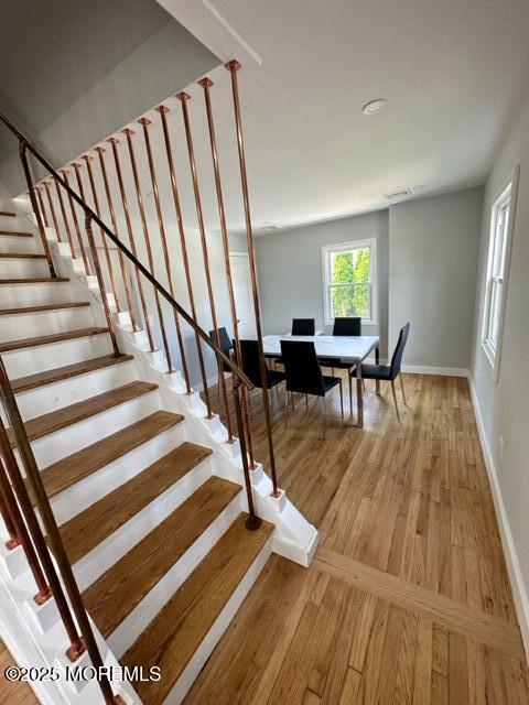 10 Cambell Court, Unit W Deal, NJ 07723 - Photo 23 of 28 a view of entryway and hall with wooden floor
