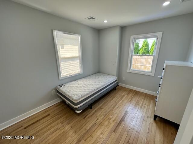 10 Cambell Court, Unit W Deal, NJ 07723 - Photo 28 of 28 a view of a room with wooden floor and window