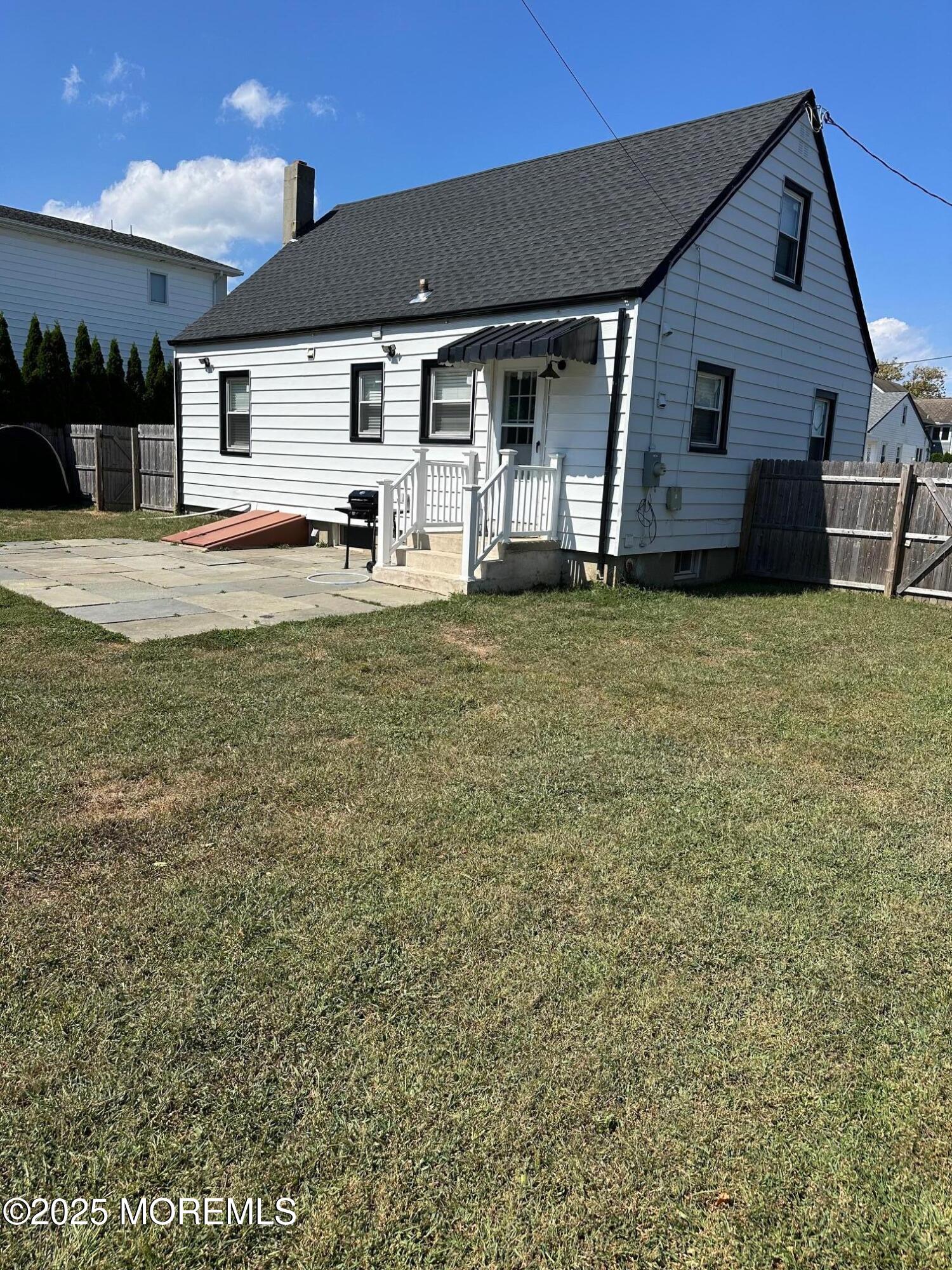 10 Cambell Court, Unit W Deal, NJ 07723 - Photo 5 of 28 a front view of house with yard
