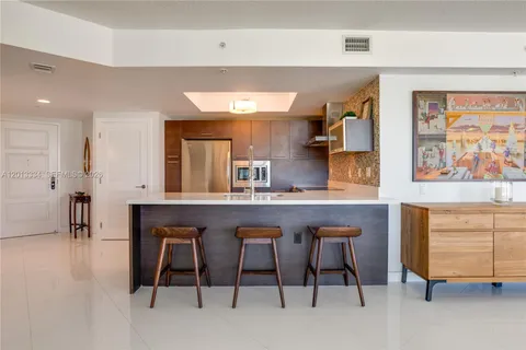 a balcony with furniture and city view