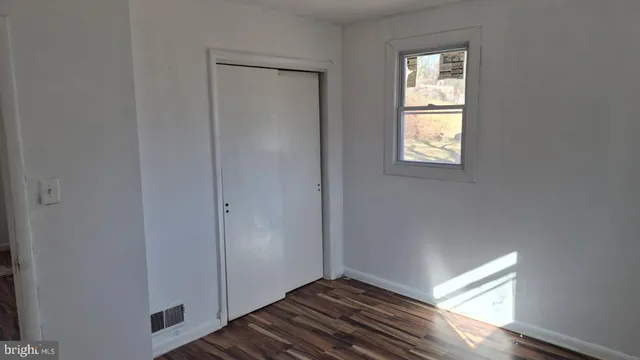 a view of an empty room and window