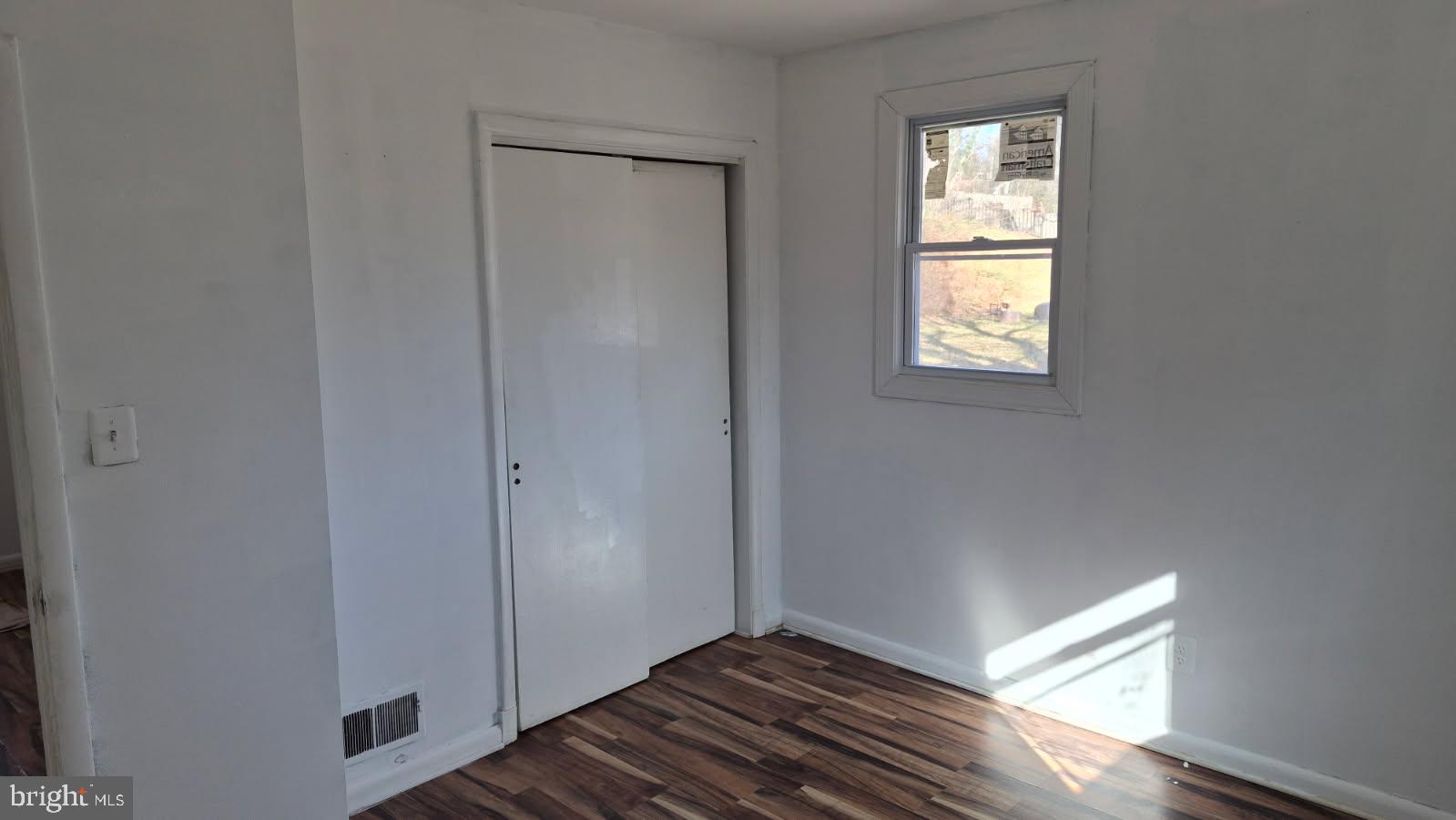 5004 Meadowbrook Drive Suitland, MD 20746 - Photo 5 of 10 a view of an empty room and window