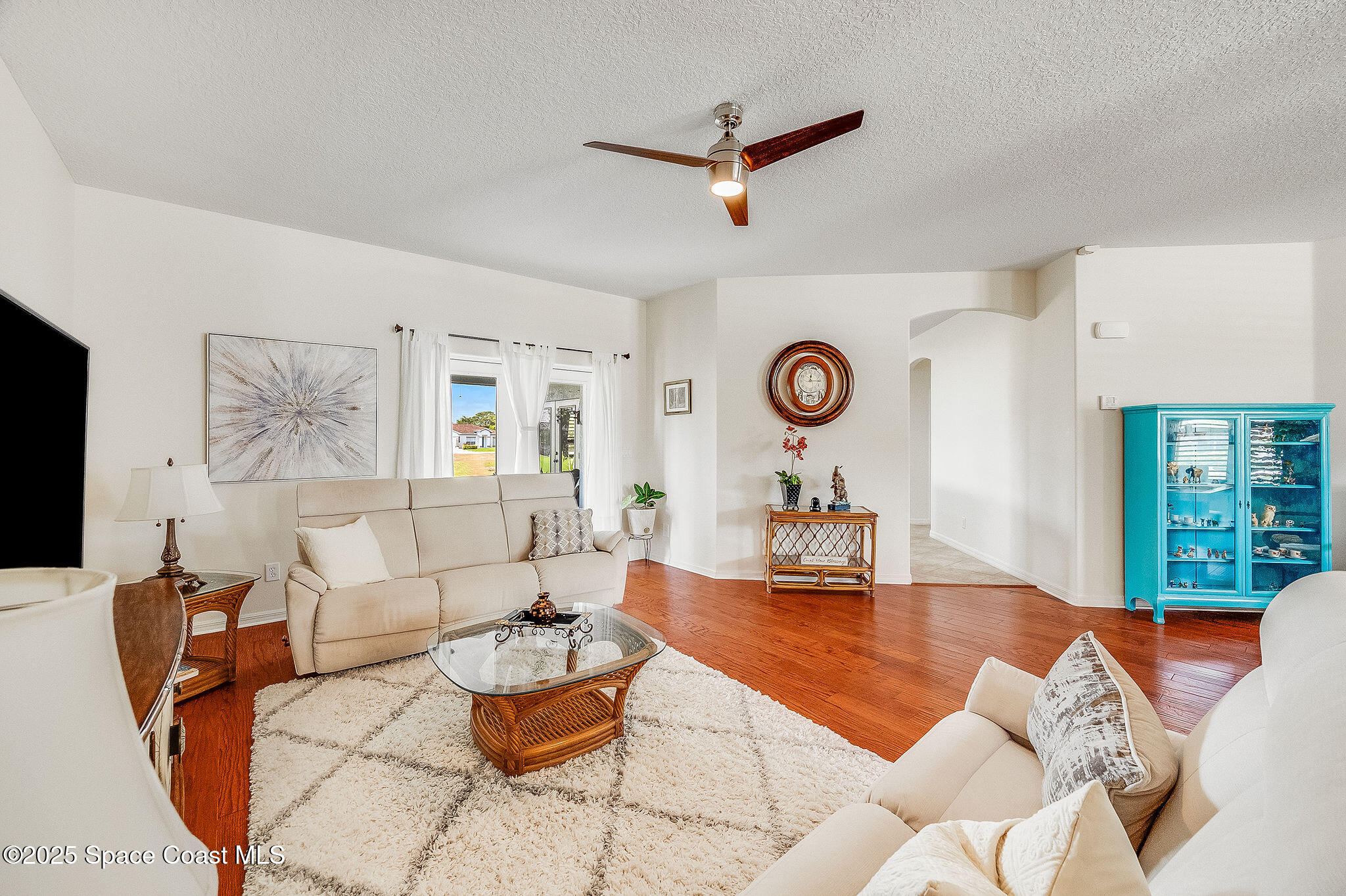 1137 Morgan Circle Northeast Palm Bay, FL 32905 - Photo 13 of 64 a living room with furniture