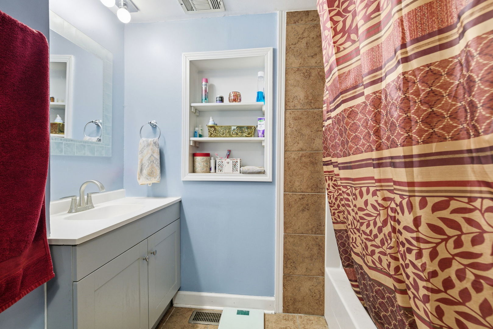1120 South Hamilton Street Lockport, IL 60441 - Photo 14 of 32 a bathroom with a sink and a mirror