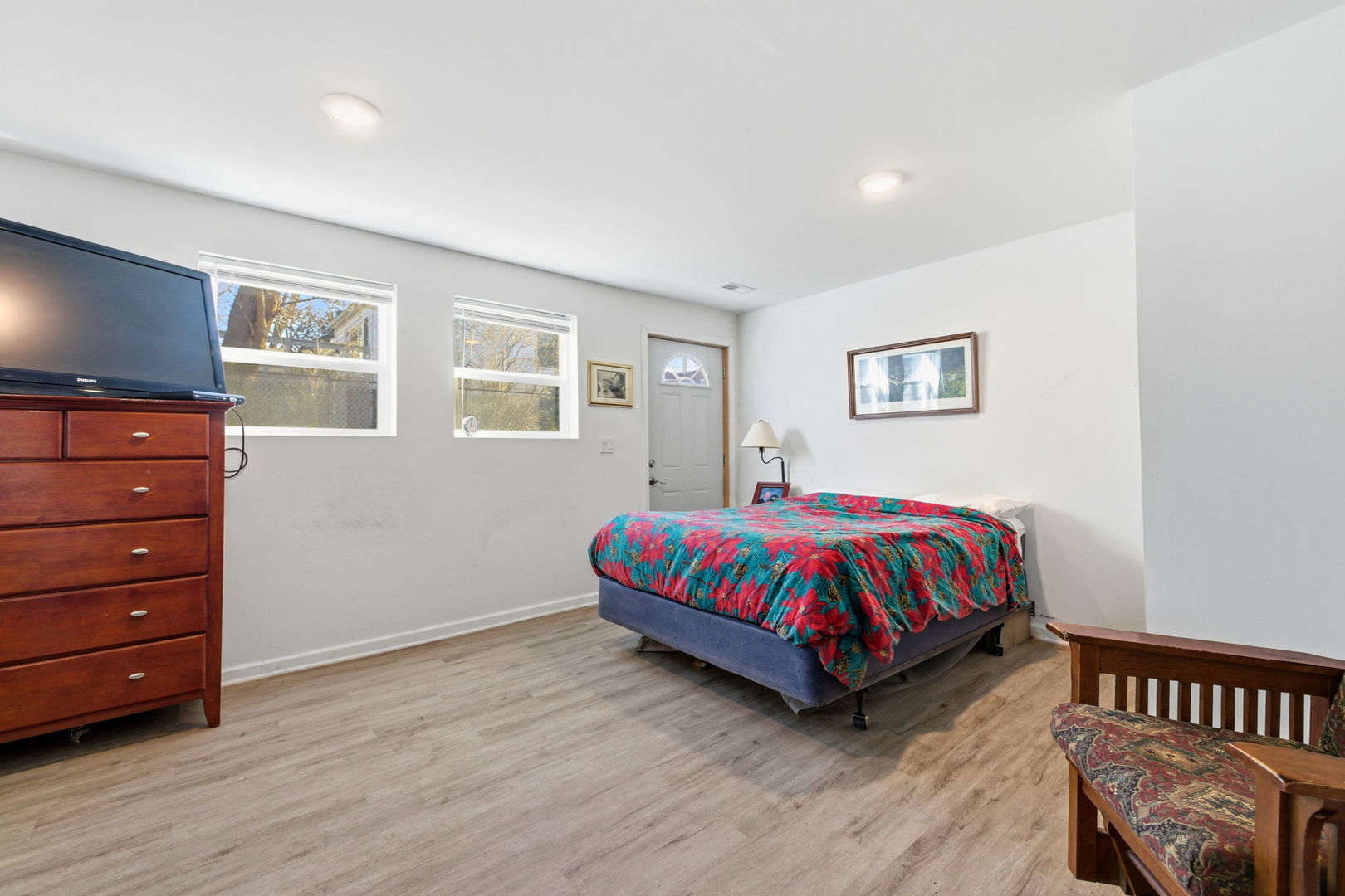 1120 South Hamilton Street Lockport, IL 60441 - Photo 15 of 32 a spacious bedroom with a bed and window
