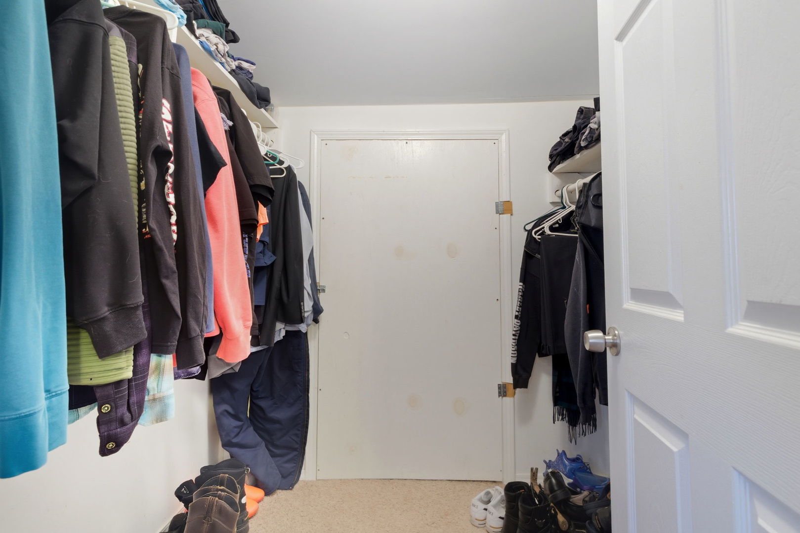1120 South Hamilton Street Lockport, IL 60441 - Photo 23 of 32 a view of walk in closet with clothes and shoes
