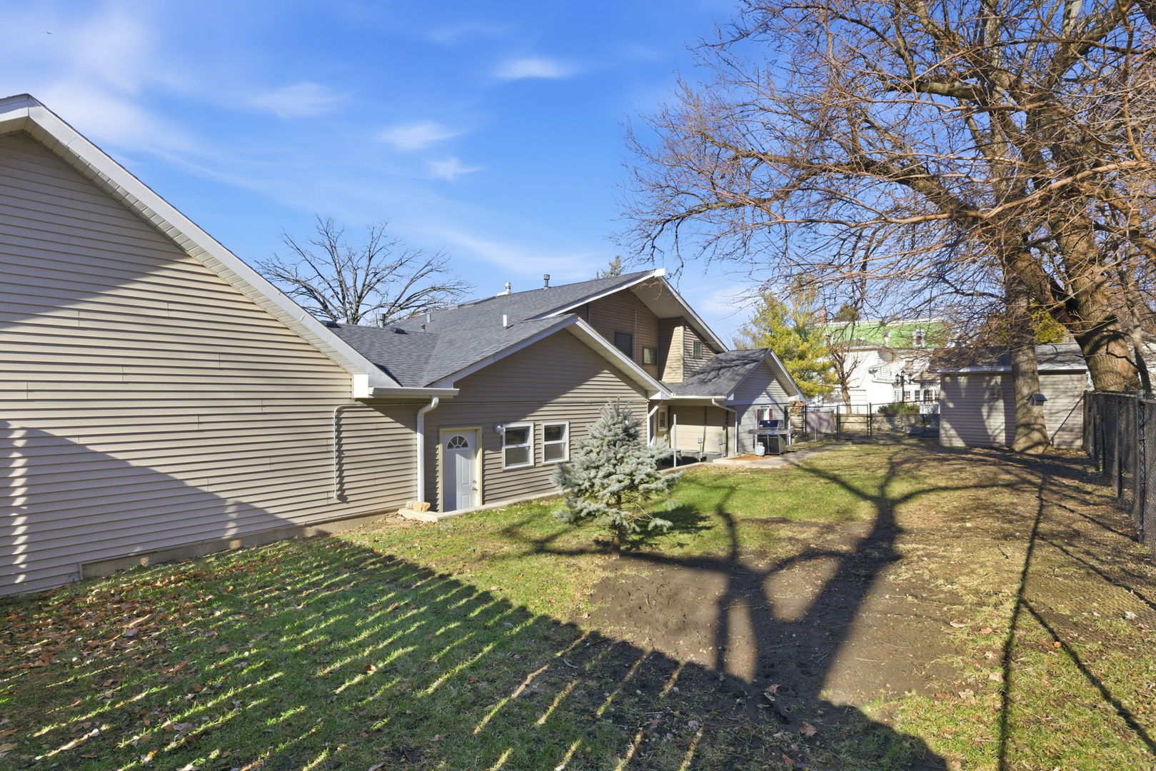 1120 South Hamilton Street Lockport, IL 60441 - Photo 24 of 32 a house with trees in front of it