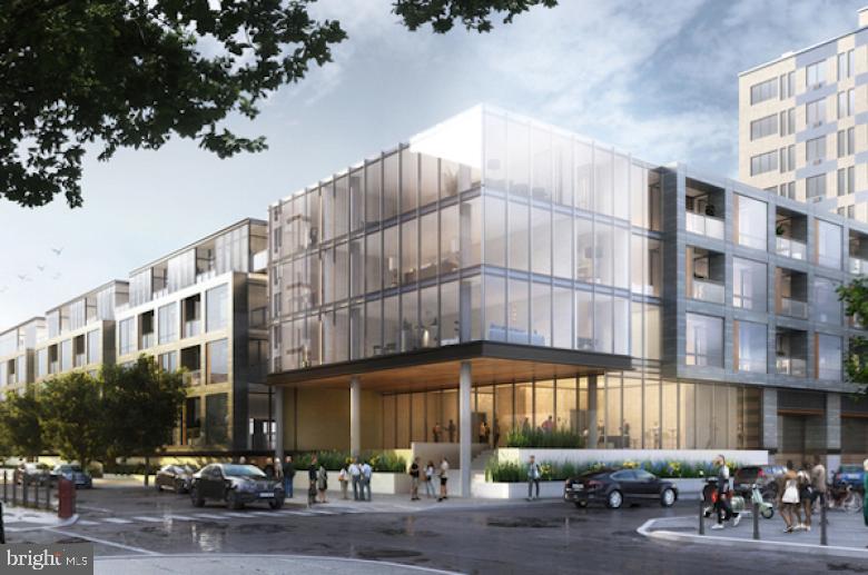 139-59 North 23rd Street, Unit 105 Philadelphia, PA 19103 - Photo 13 of 20 a city street lined with tall buildings and cars