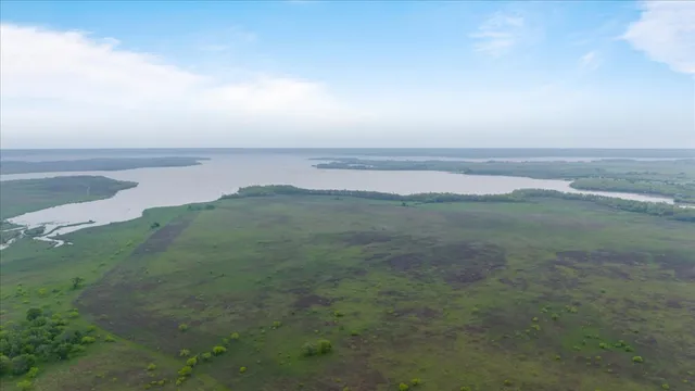 a view of an ocean with beach