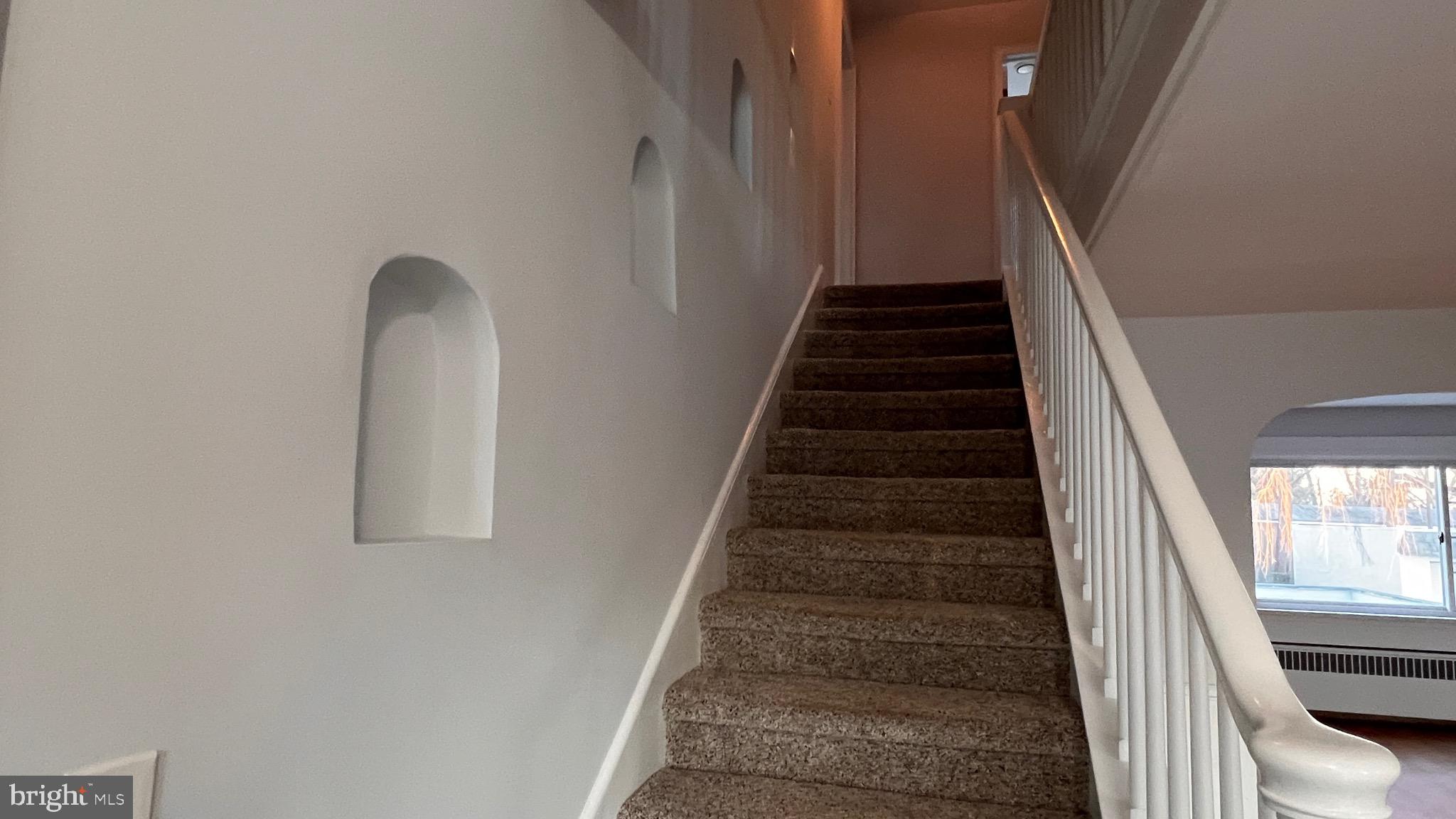 1026 Lawrence Road Lawrence Township, NJ 08648 - Photo 22 of 48 Stairs to 2nd
floor with in wall NIches