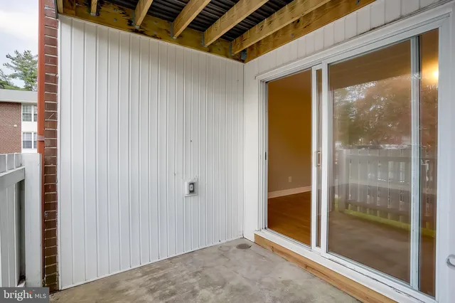a view of backyard with large window