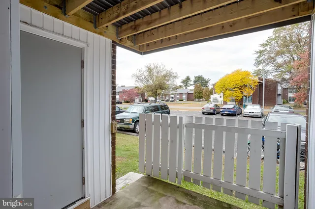 a view of balcony with furniture