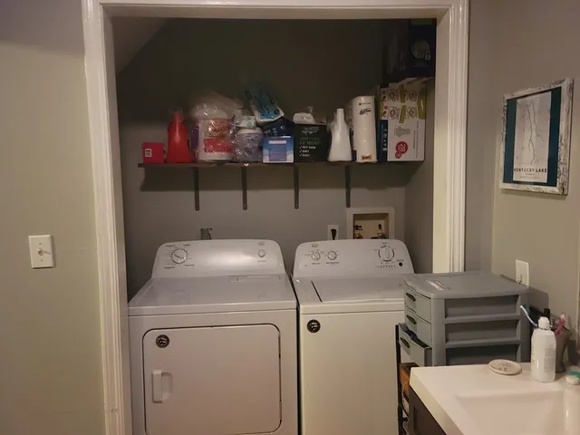 a utility room with dryer and washer