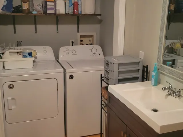 a utility room with dryer and washer