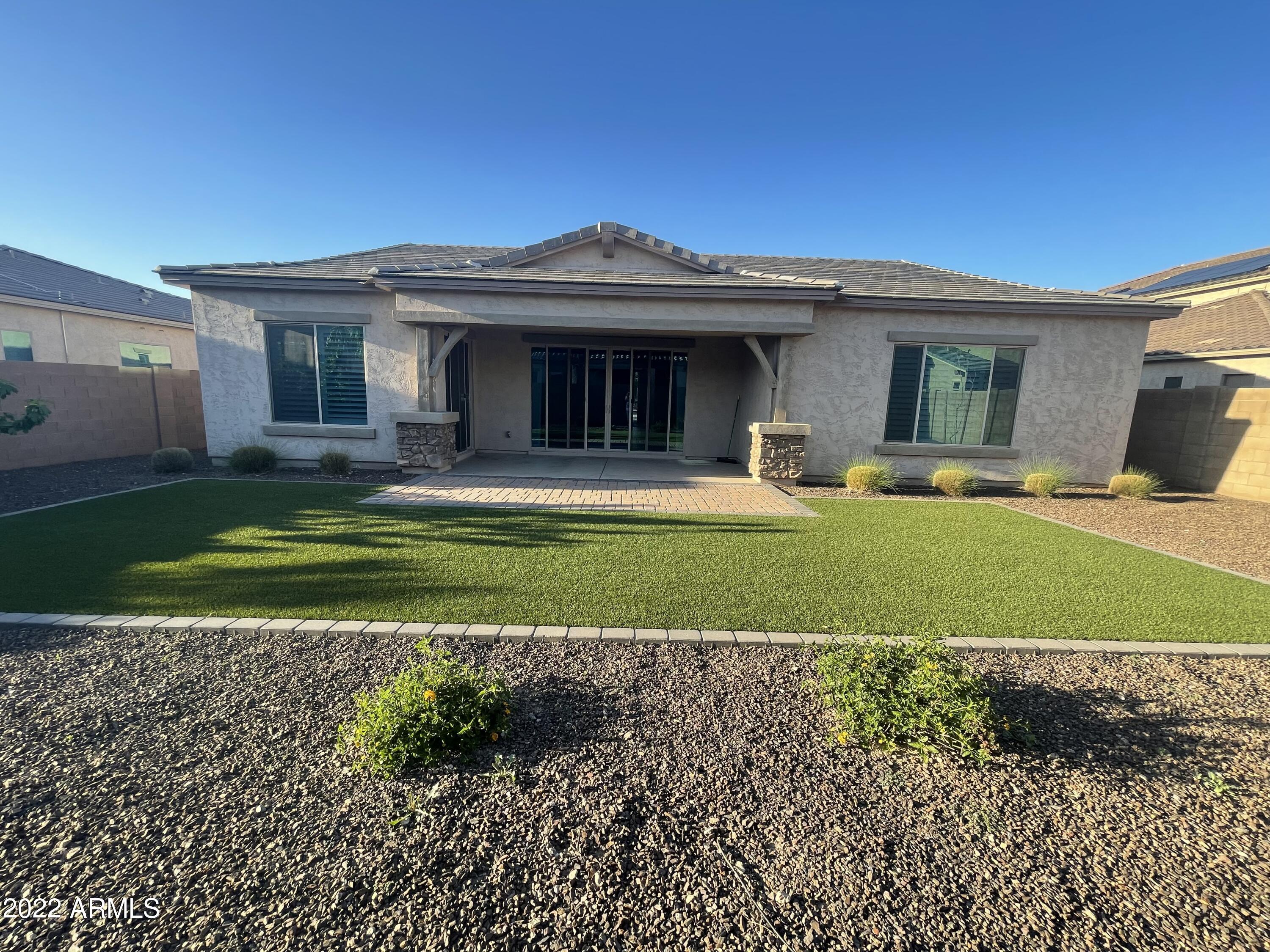 991 East Hampton Lane Gilbert, AZ 85295 - Photo 10 of 13 a view of a house with a yard