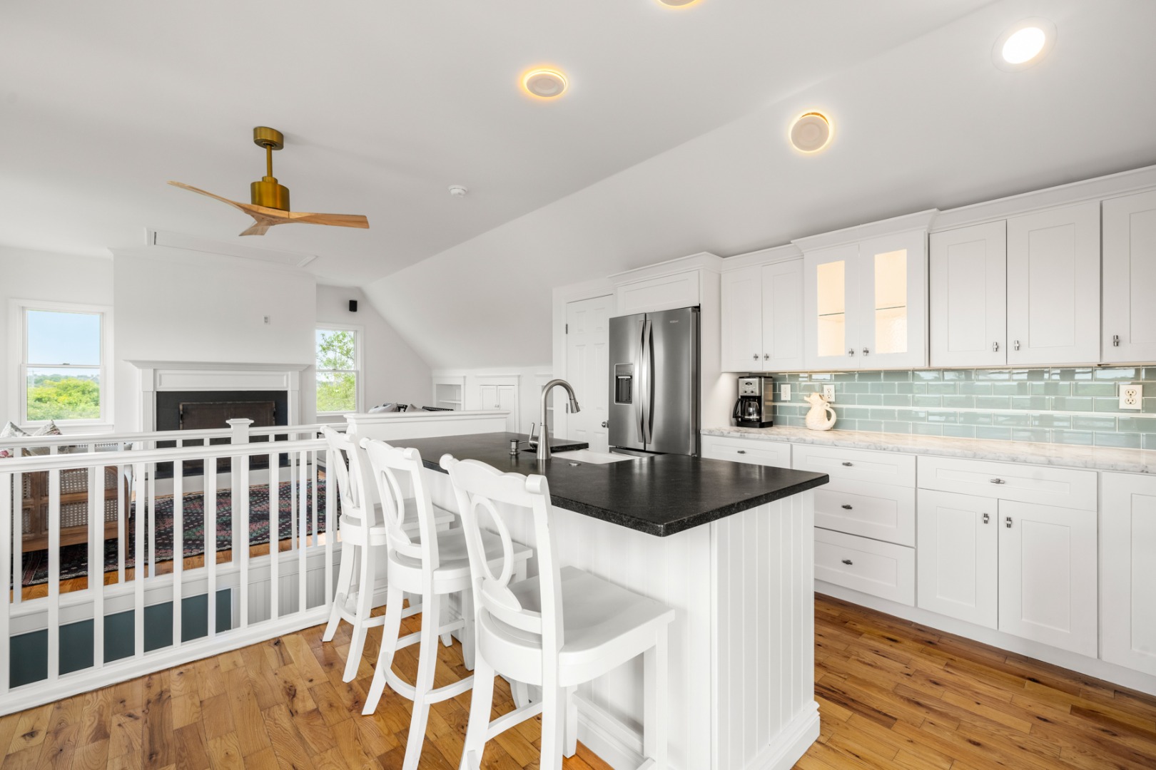 4 Berkley Street Nantucket, MA 02554 - Photo 15 of 47 a kitchen with stainless steel appliances kitchen island granite countertop a sink and cabinets
