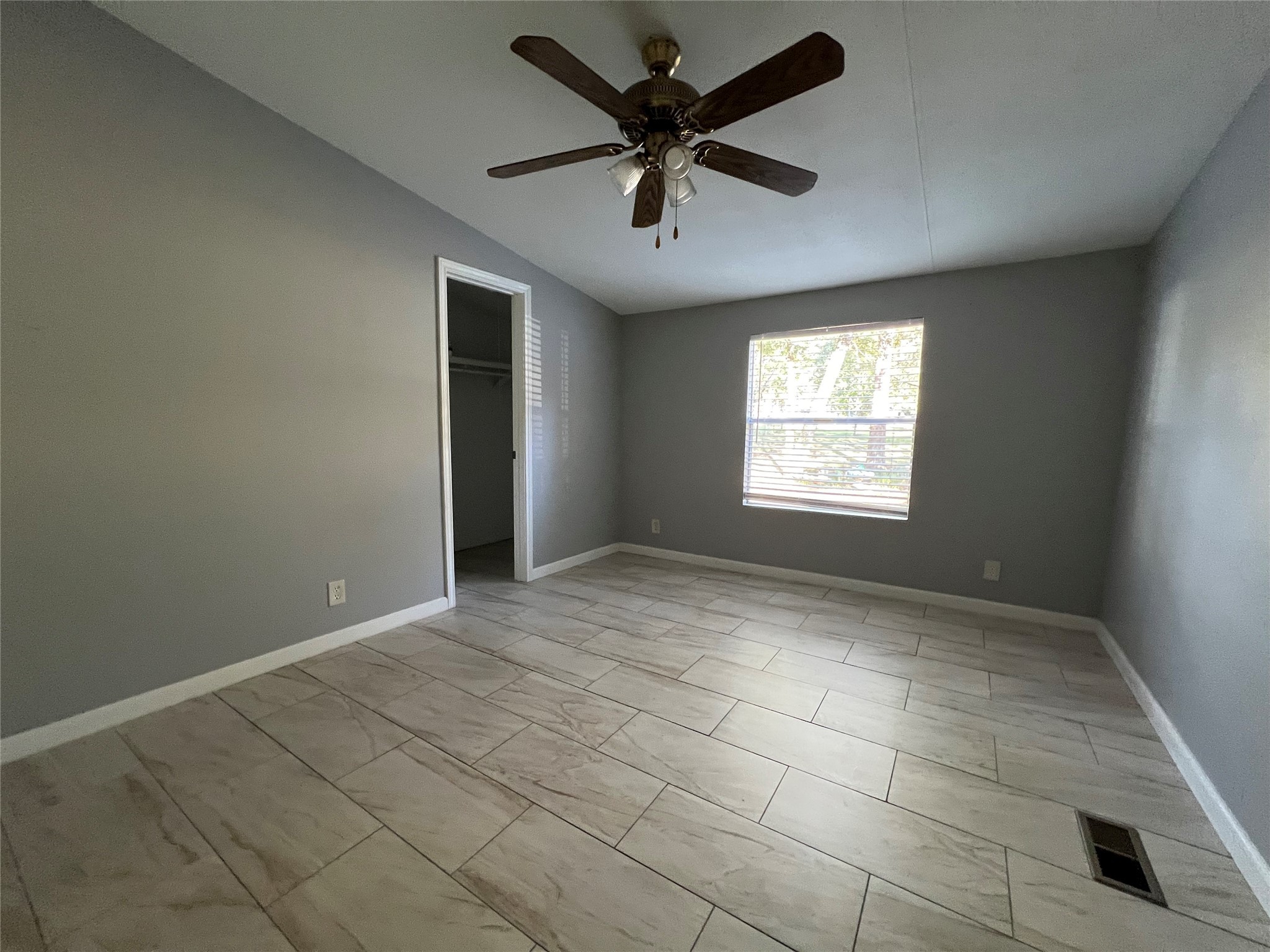 66 McFaddin Road Huntsville, TX 77340 - Photo 11 of 22 a view of an empty room and window