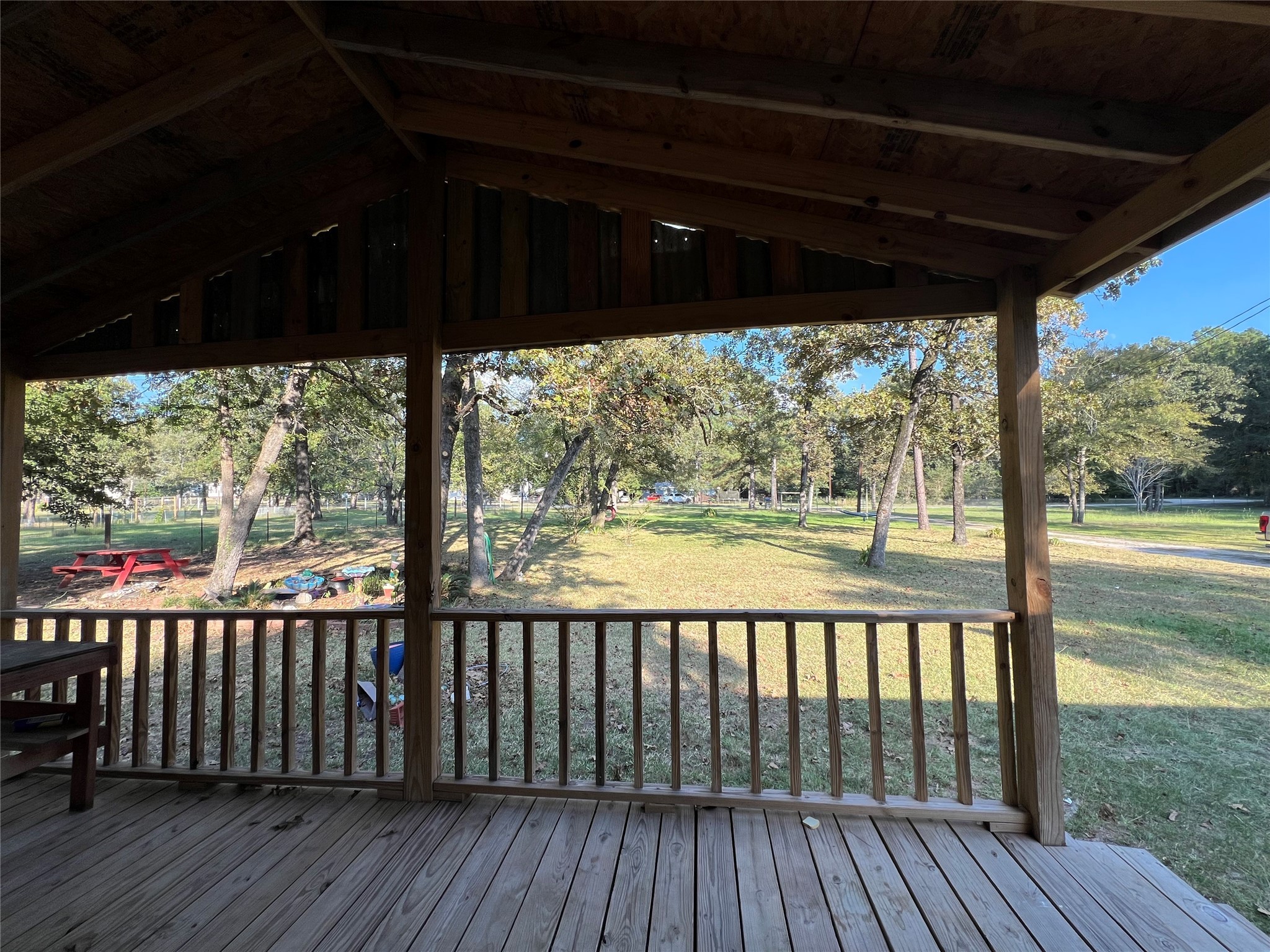 66 McFaddin Road Huntsville, TX 77340 - Photo 13 of 22 a view of a large window with wooden floor